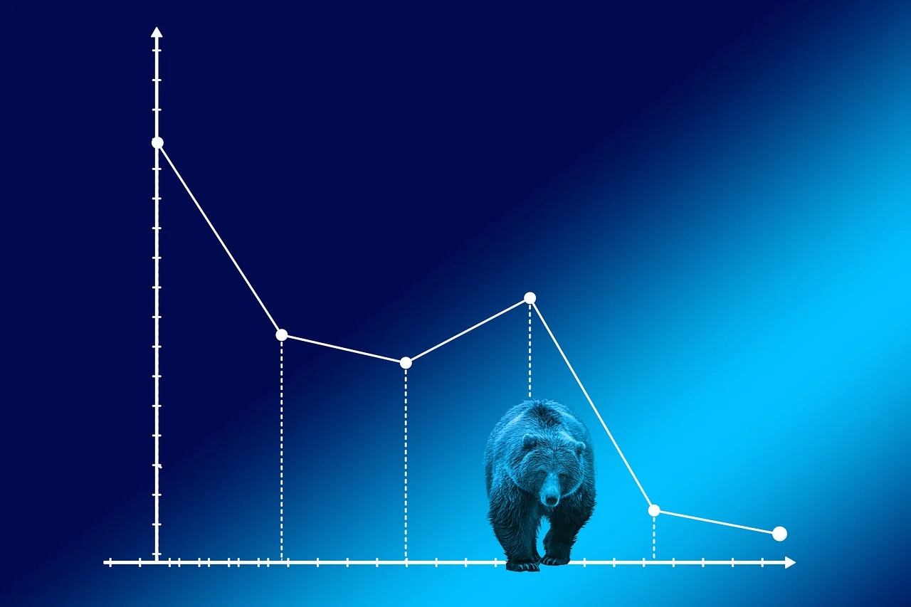 An illustration of a bear market with a bear walking on a line graph