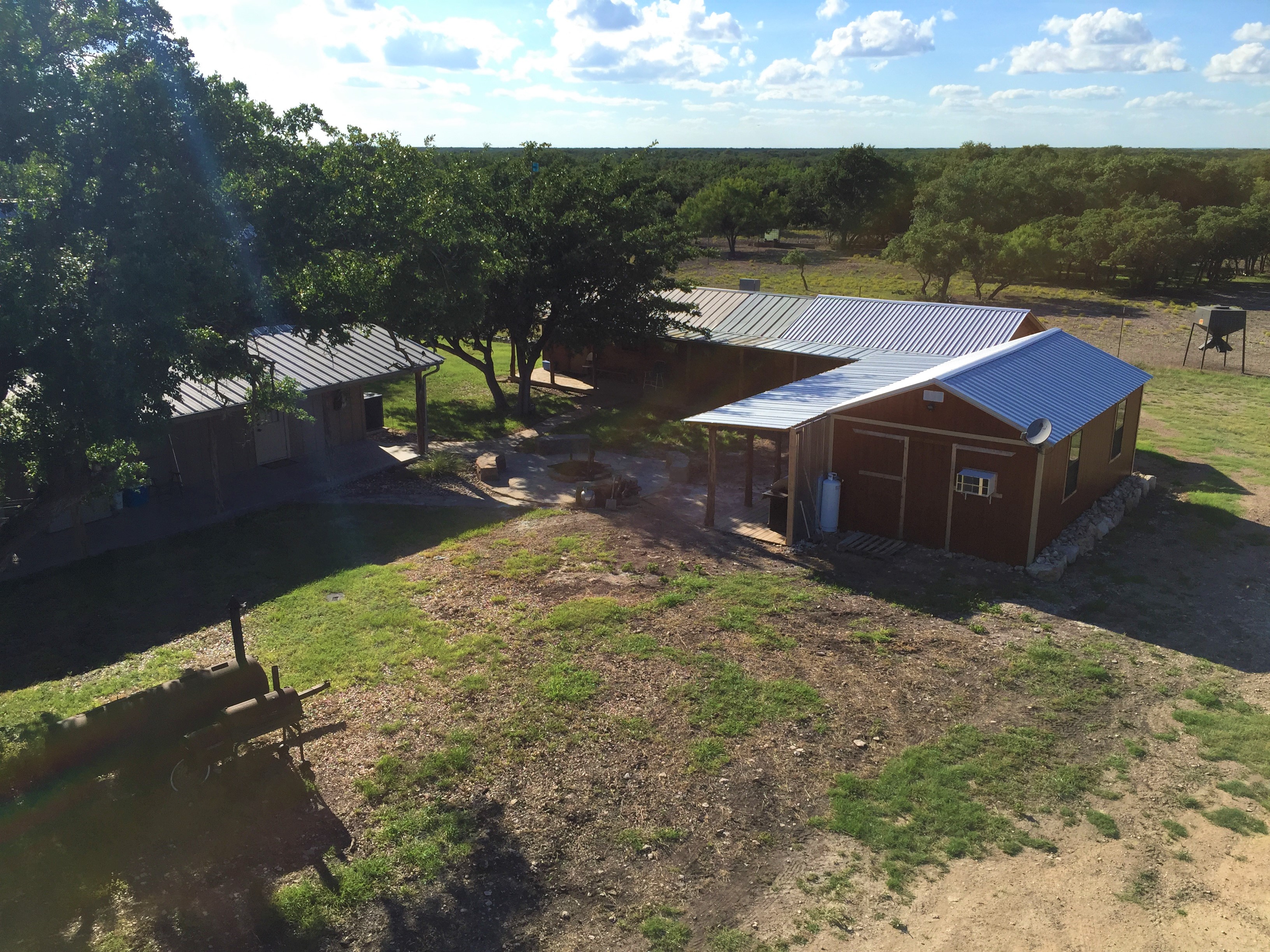 Aerial view of the cabins and gathering area at FF Hunting Ranch